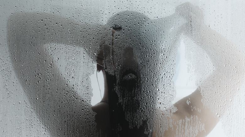 Woman in steam shower