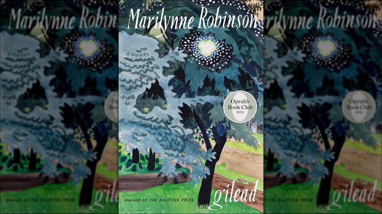 The cover of Marilynne Robinson's novel Gilead with a watercolor forest