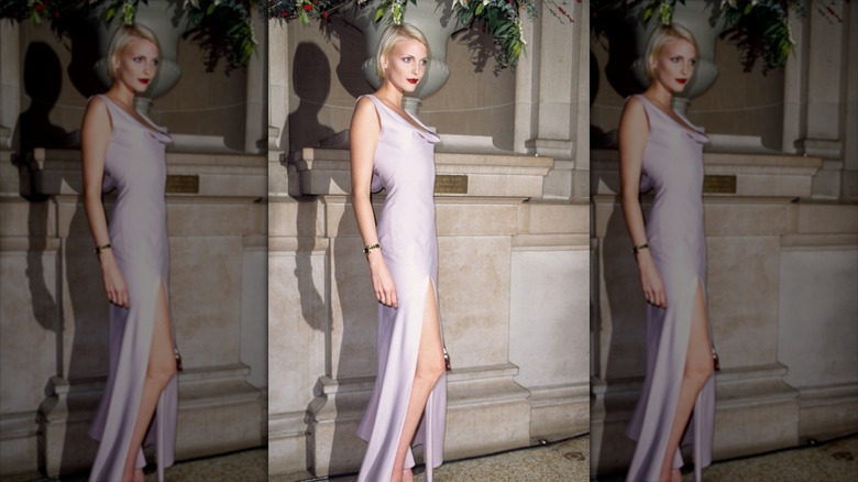 Nadja Auermann poses wearing a lavender slip dress at Met Gala