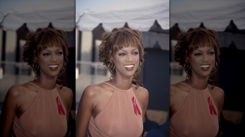 Tyra Banks with a honey-blonde fringe