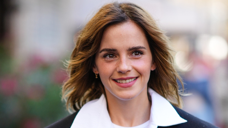 Close-up of Emma Watson smiling at 2022 Paris Fashion Week