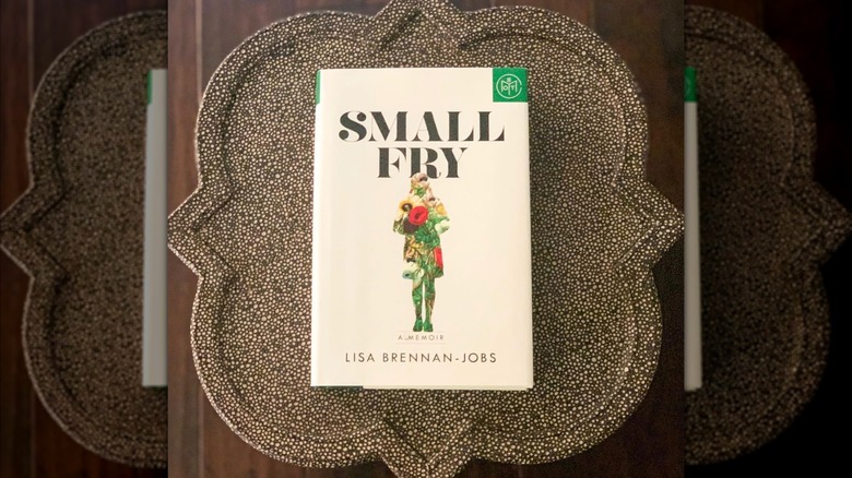A copy of the book "Small Fry" sitting on a speckled table