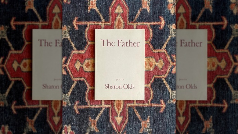 A collection of poems lying on a blue and red patterned rug