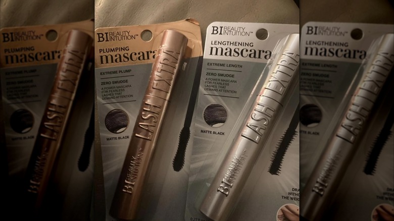 Up-close snapshot of two packaged mascaras from Beauty Intuition, featuring rose gold and silver tubes