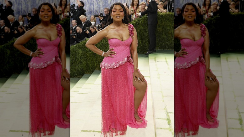 Angela Bassett posing in a pink dress on the 2026 Met Gala red carpet