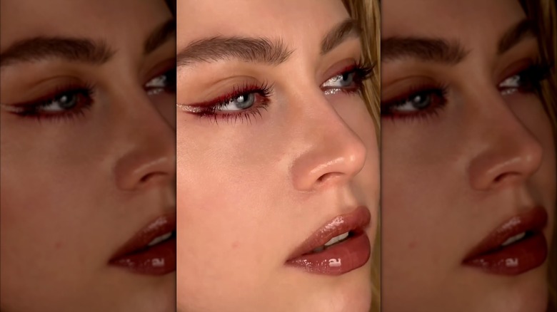 A woman with red eyeliner on Instagram
