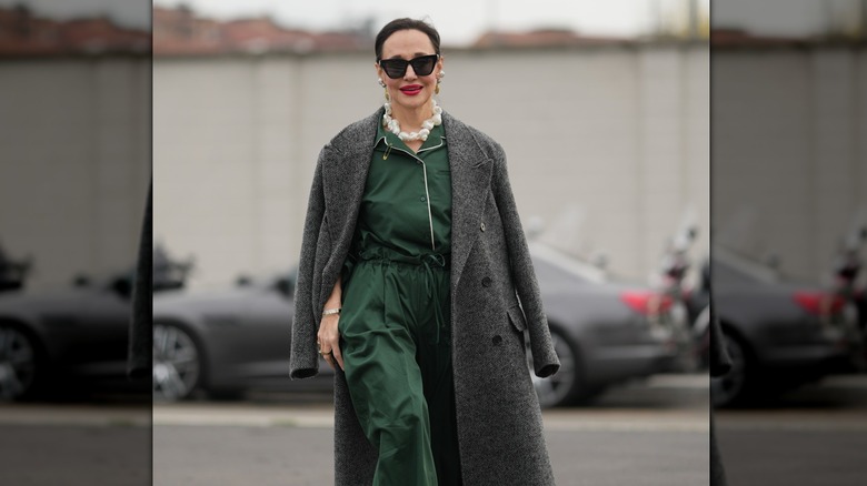 A guest attends Menswear Fall/Winter 2026-2027, on January 18, 2026 in Milan, Italy