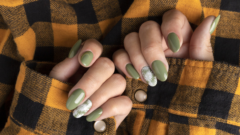 Olive nails on orange flannel