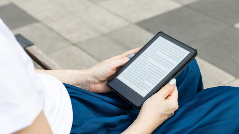 Woman reading kindle