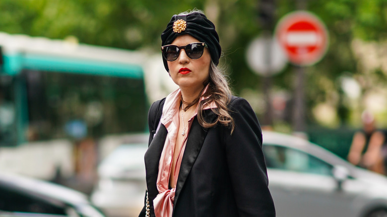 Wearing black turban 