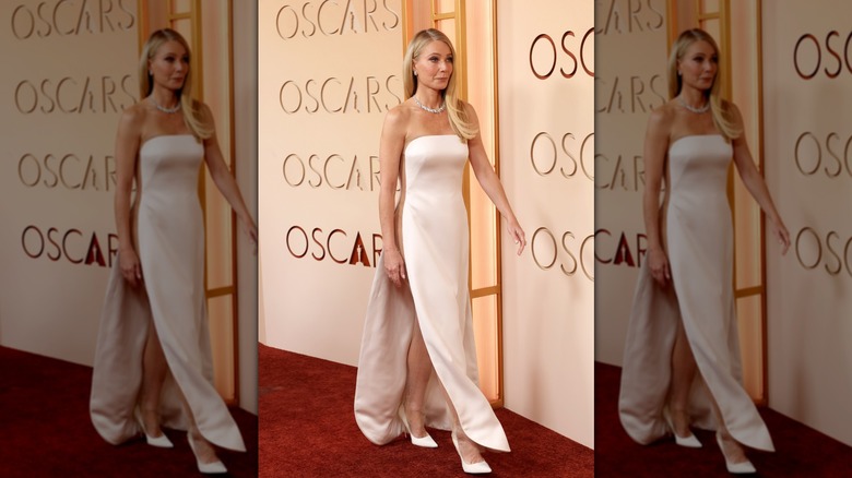 Gwyneth Paltrow on the red carpet in a white column dress