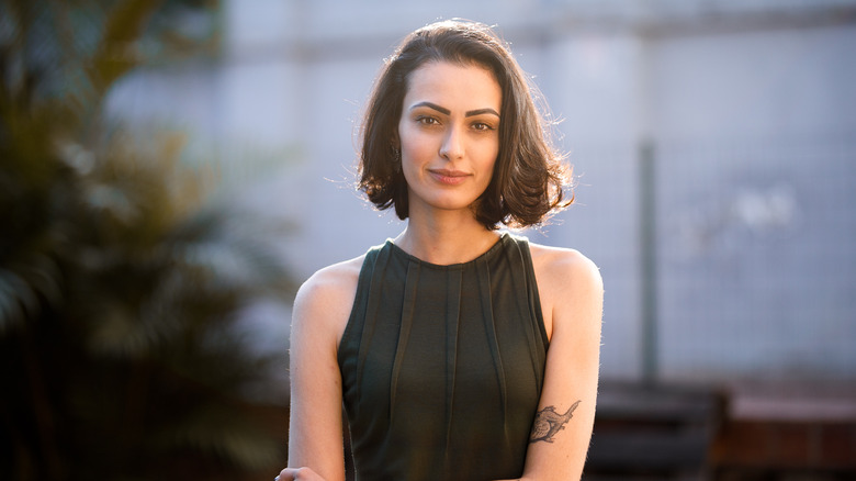 Woman with short hair smiling