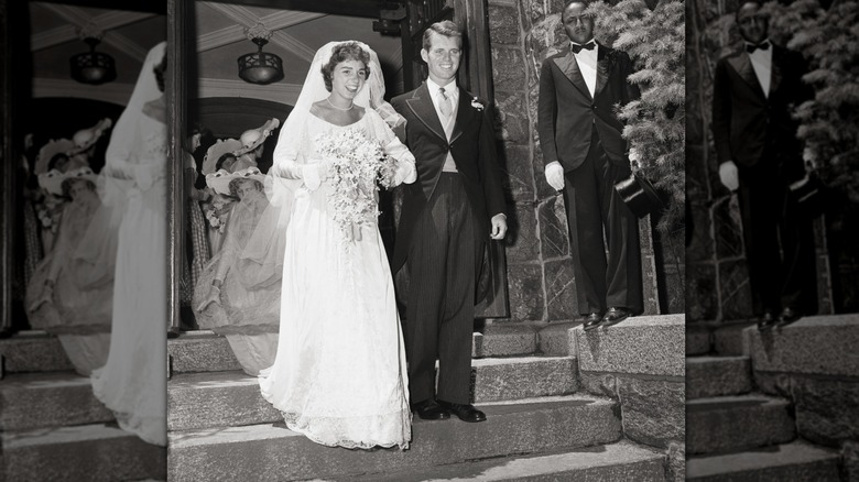Ethel Kennedy emerging from a church in a wedding gown with Robert F. Kennedy