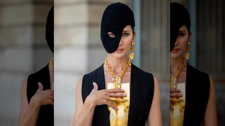 Gold jewelry and mask 
