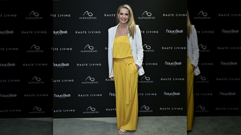 Cheryl Casone in a yellow outfit at an event
