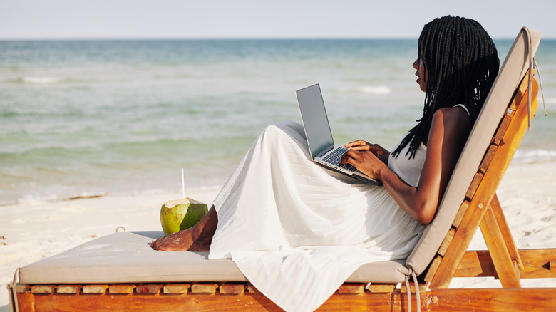 woman working while on vacation