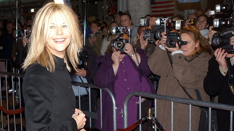 Meg Ryan with photographers in 2021