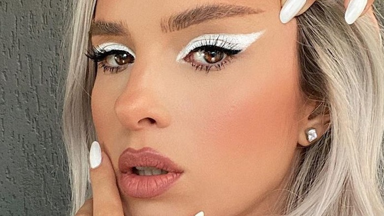 Wearing white eyeliner
