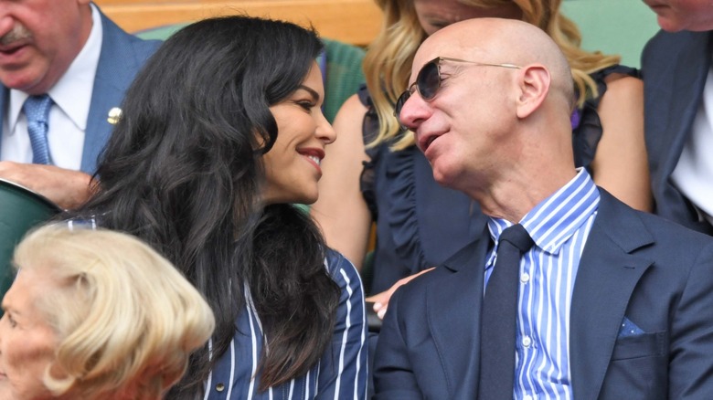 Lauren Sánchez Bezos and Jeff Bezos gazing into each other's eyes at Wimbledon in 2019