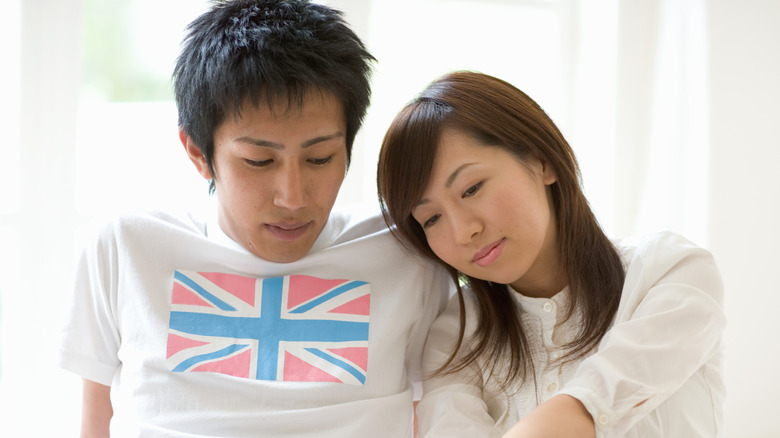 man and woman in bed