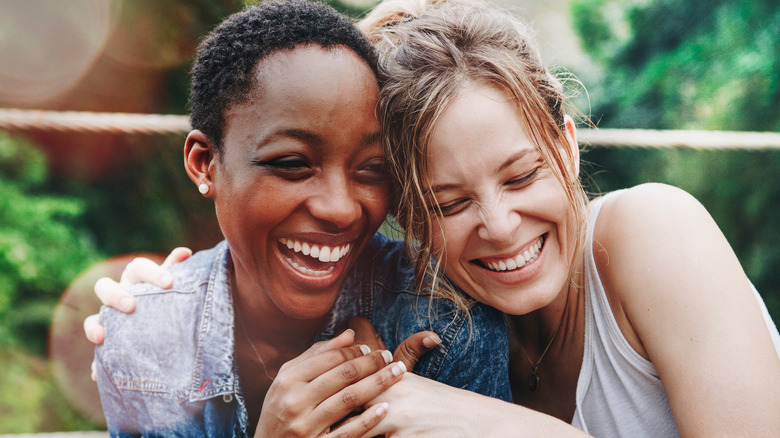 two women embracing 