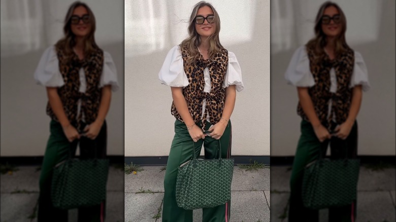 woman wearing leopard print blouse
