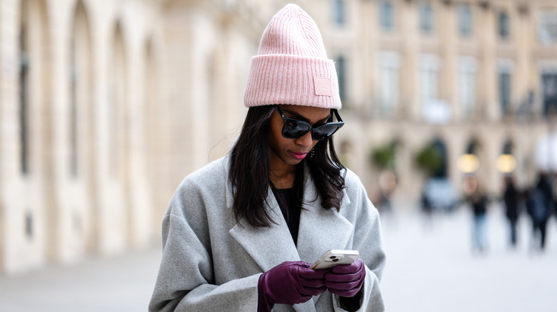 A young woman using her phone 