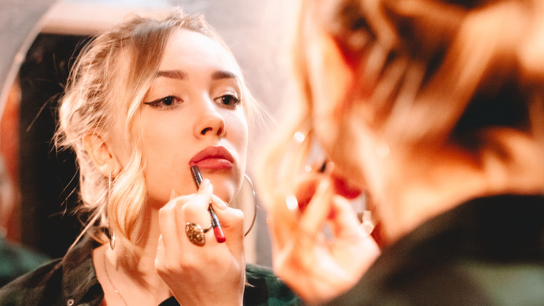 Applying lip pencil