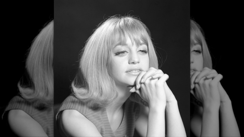 Goldie Hawn poses with a flicked-out bob