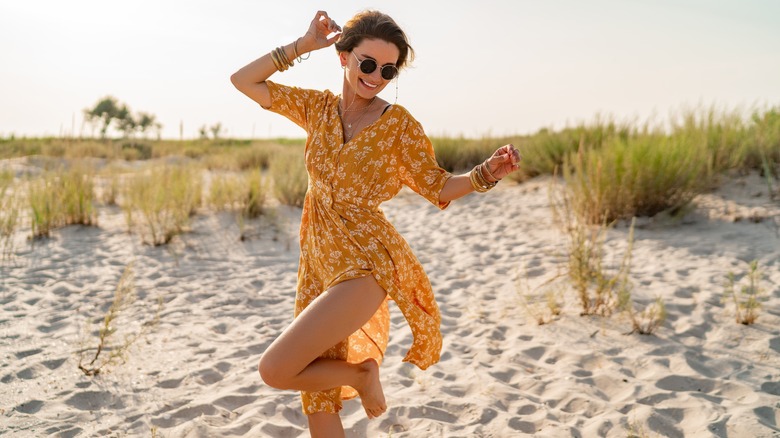 Woman wearing dress on beach