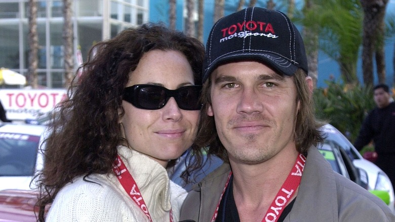 Minnie Driver and Josh Brolin smiling together at an event in 2001