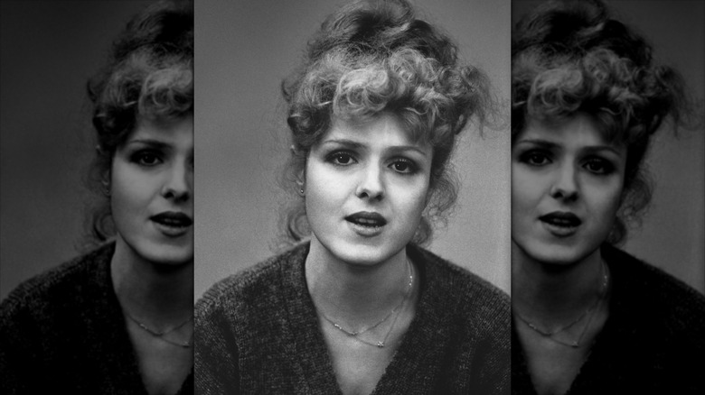 A black-and-white headshot photo of Bernadette Peters with curls hair in 1976.