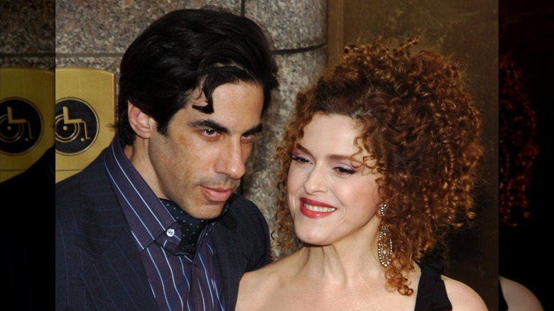 Michael Wittenberg in a blue suit with Bernadette Peters wearing a black dress with pendant earrings at the 2005 Tony Awards.