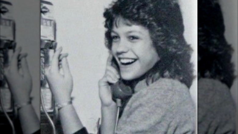 Young Rachael Ray talking on the phone