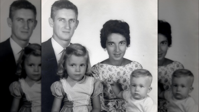 A black-and-white photo of Vanna White as a young girl with her mom, dad, and brother