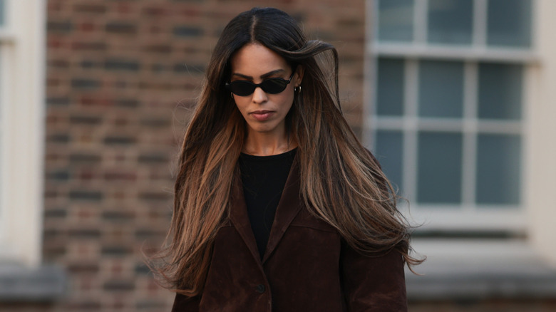 Woman with wavy brunette hair
