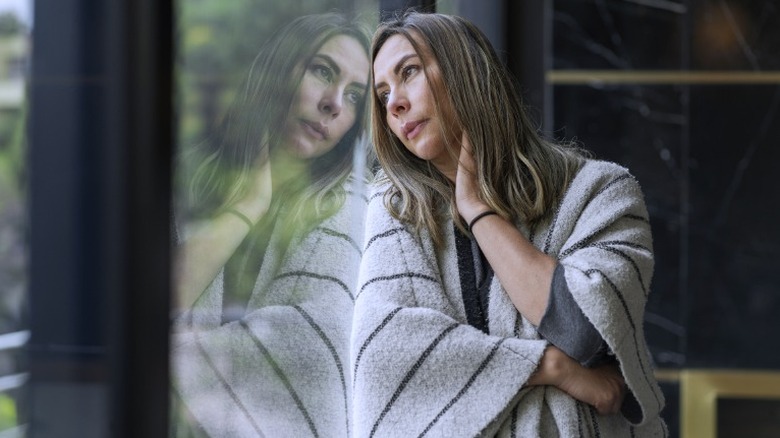 Leaning on window