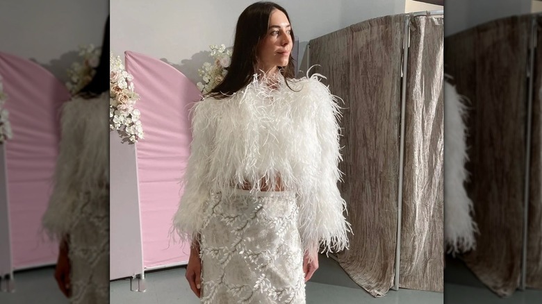 woman wearing feather top