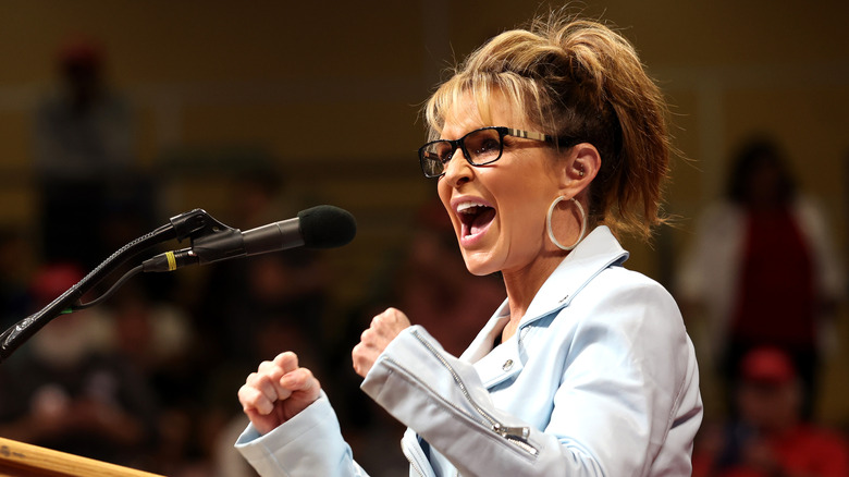 Sarah Palin speaking at a podium
