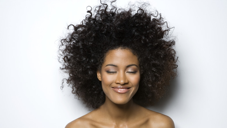 Woman with brown hair smiling 