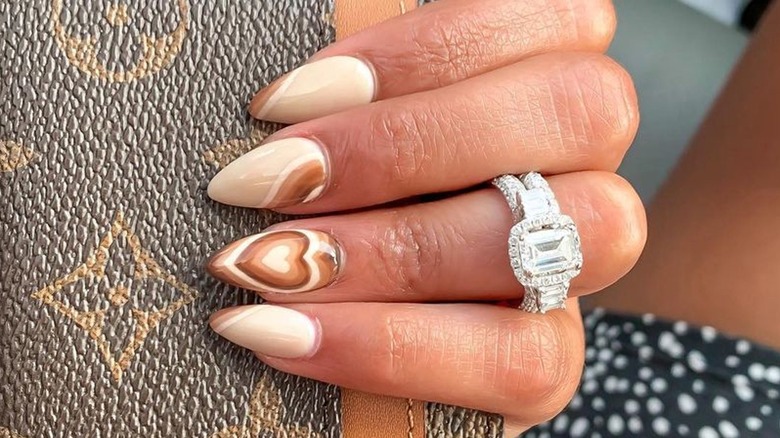 Person with latte nails