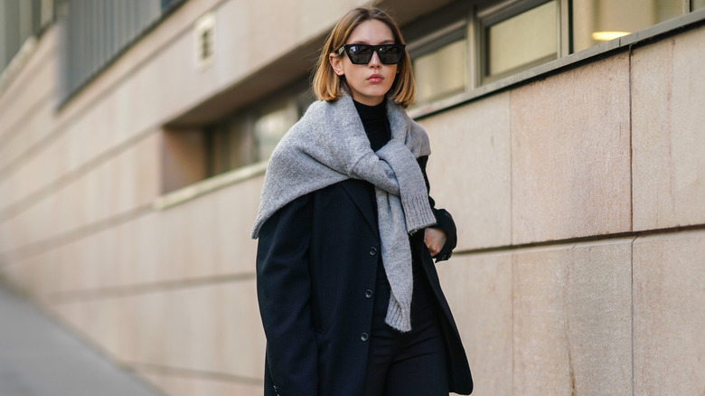 Woman in layered tops 
