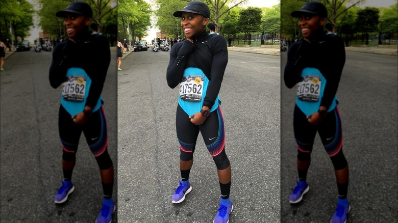 Cynthia Erivo on the street in a running kit