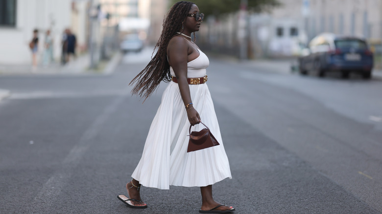 Wearing white dress