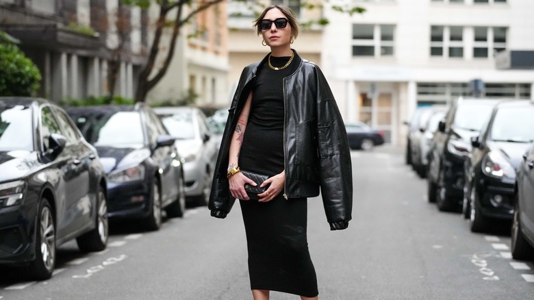 woman wearing long black dress