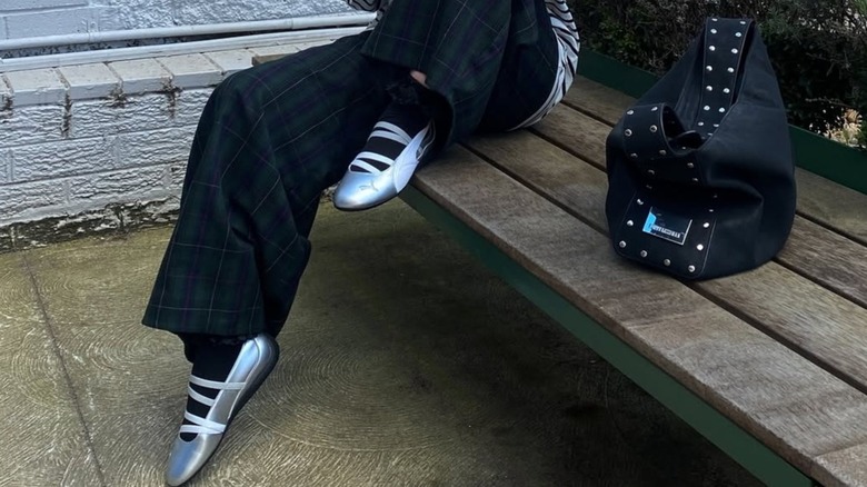 Influencer Yasmin wearing the Puma Speedcat Ballets in Silver