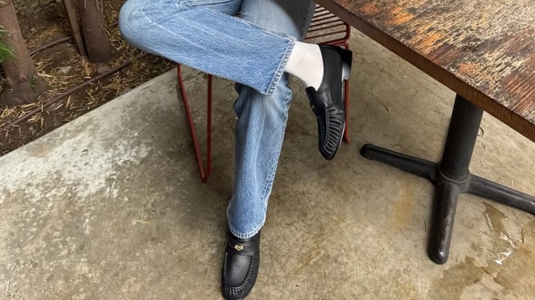 Lindsey Rem wearing black slip-on loafers from Aritzia and G.H. BASS