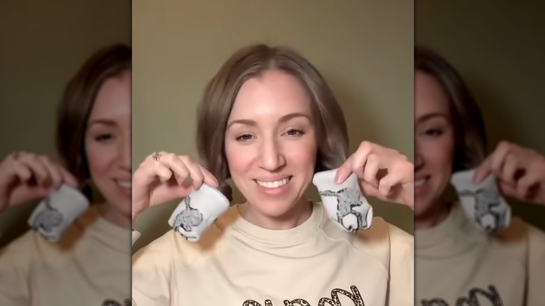A woman showing her low sock curls on YouTube