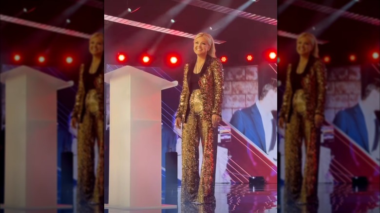 Erika Kirk in a gold pantsuit in December 2025