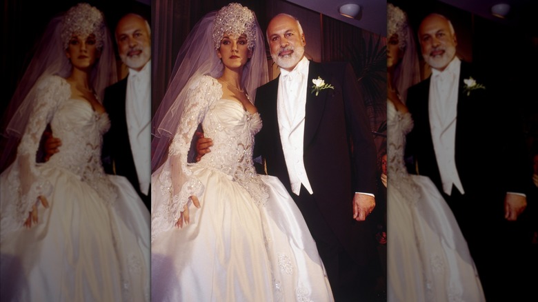Celine Dion posing with her husband René Angélil on her wedding day